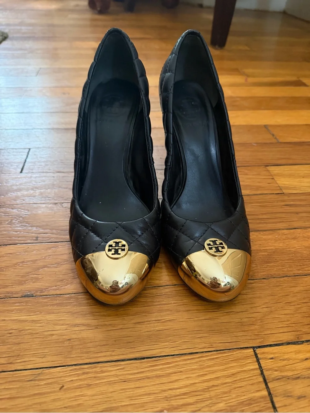 Tory Burch Black Quilted Leather Pumps with Gold Toe Cap Accent